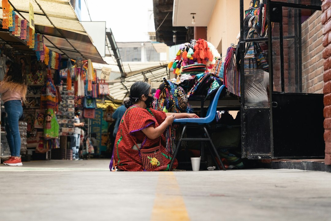 Mexican customer support agent assisting client over the phone