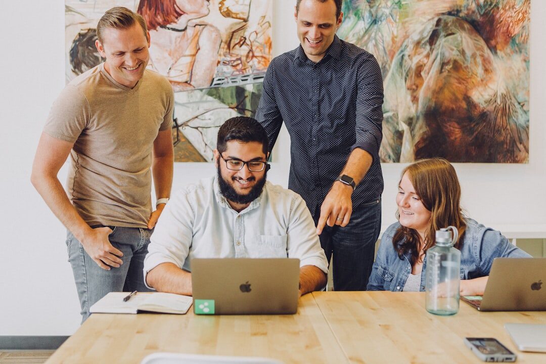 team discussing insurance software