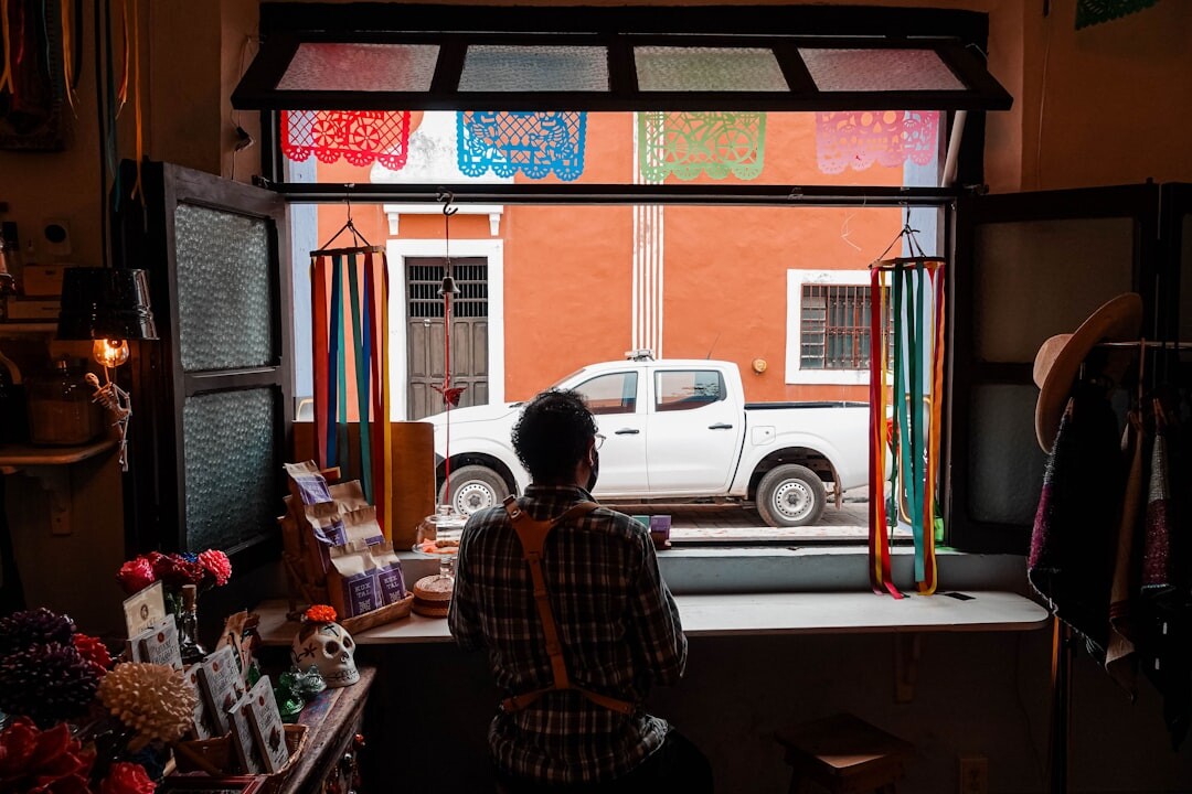 Mexican software developer working on insurance platform dashboard